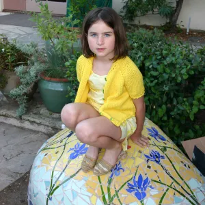 girl on mosaic rock, Alice's Garden, book signing event at SBBG