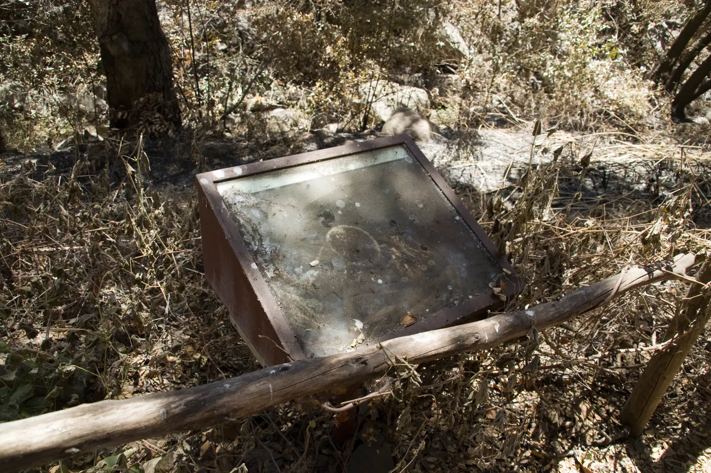 burned Fiber Arts Display case after the Jesusita Fire