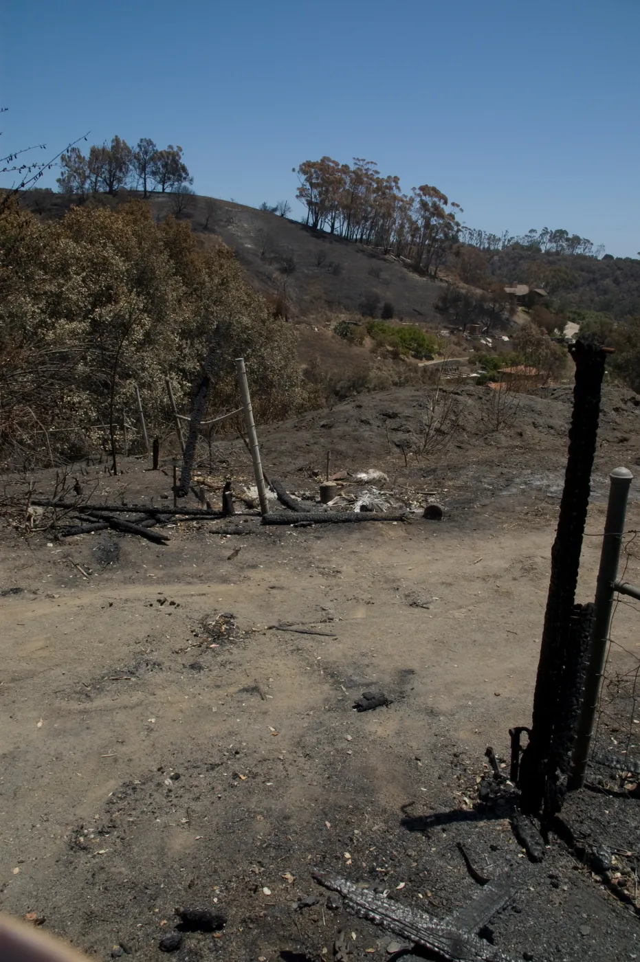 burned fence and gate, between the Porter Trail and Chip Pile. after the Jesusita Fire