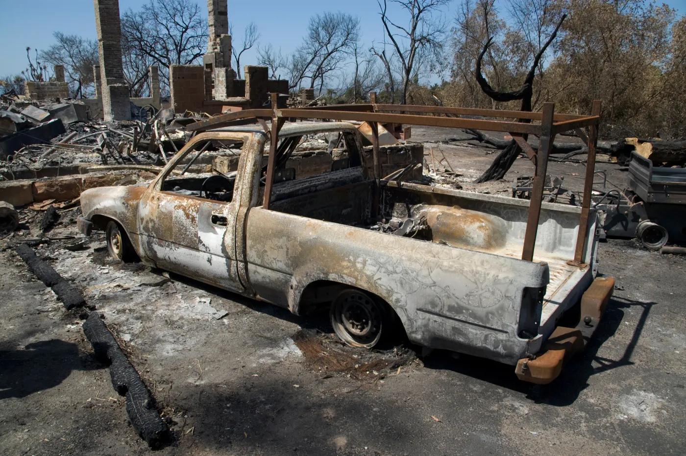 burned truck in front of Gane House after the Jesusita Fire