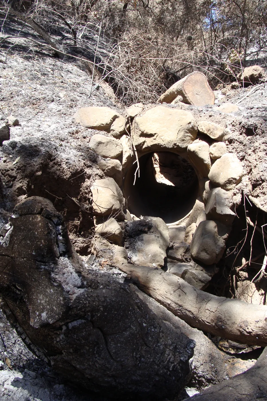 rock drainage pipe, drainage from Tunnel Road at the base of Canyon Trail and Pritchett Trail intersection, after the Jesusita Fire