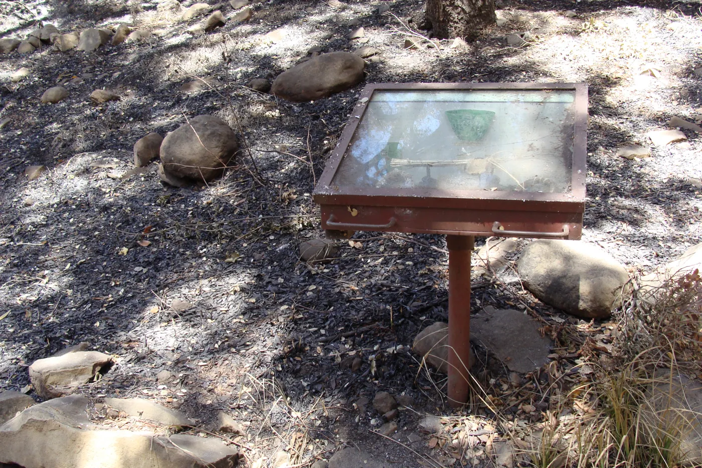 Fiber Arts Display case, after the Jesusita Fire