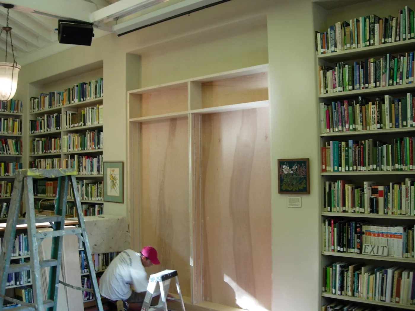 new library shelves installed in former doorway to the Main Office, SBBG 2006 Projects