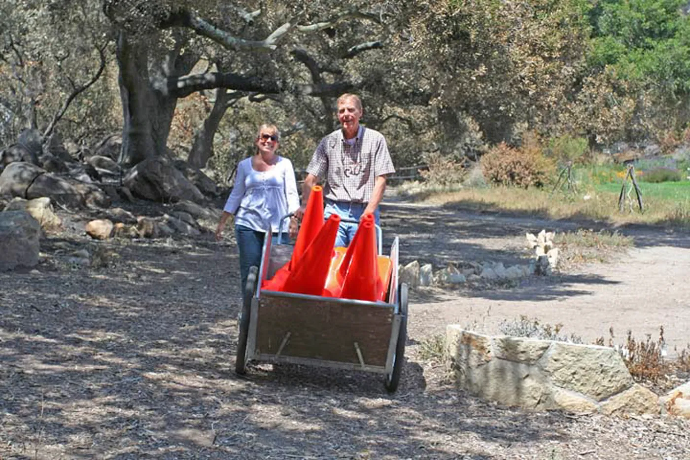 Tricia Wardlaw and Bob Muller distributing safety cones at trails closed by the Jesusita Fire