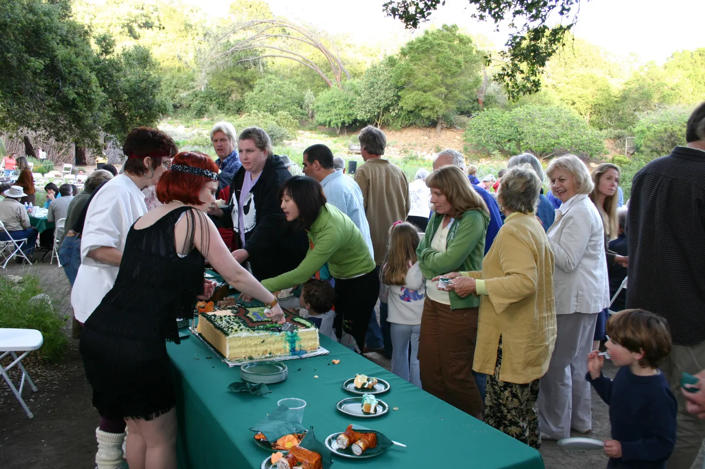 SBBG 80th Birthday Celebration, serving cake
