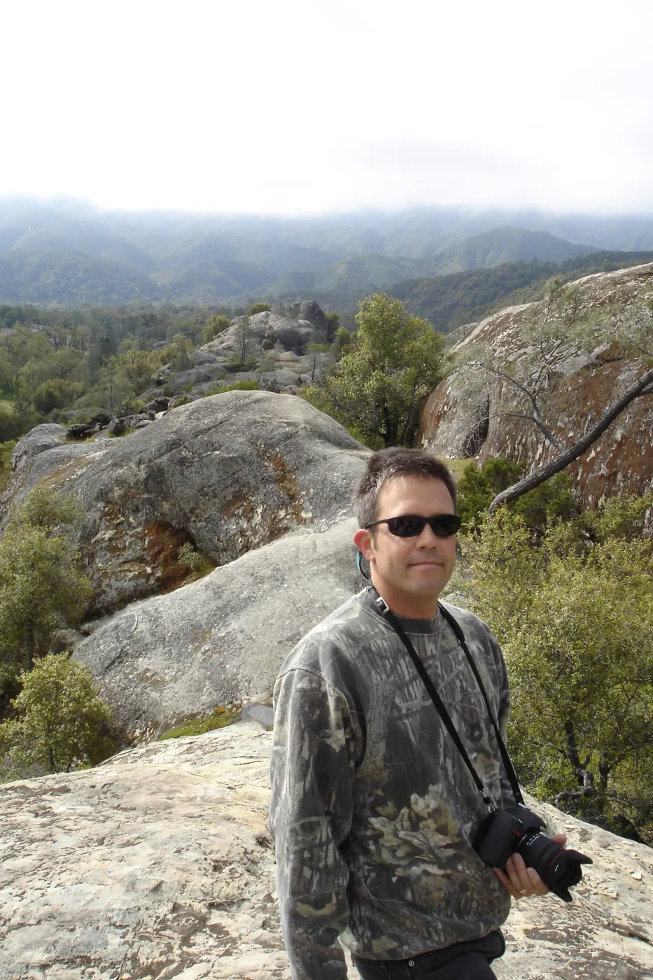 John Wardlaw, view from top of Wagon Caves rock shelter, Fort Hunter Liggett, SBBG Research and Conservation staff field trip, 2006
