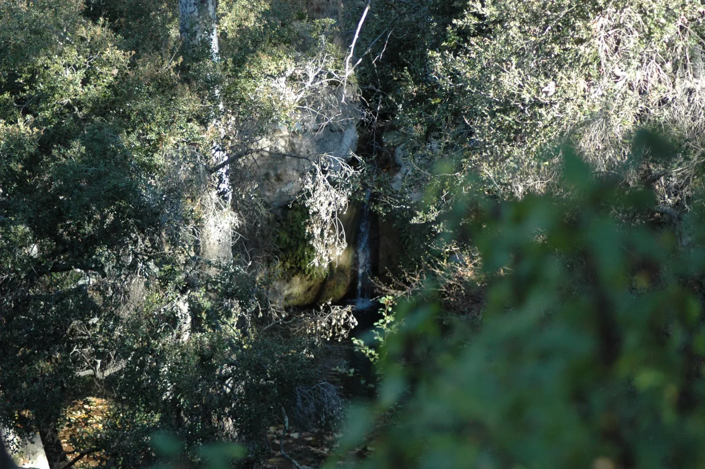 view from canyon rim down to Mission Dam and aqueduct