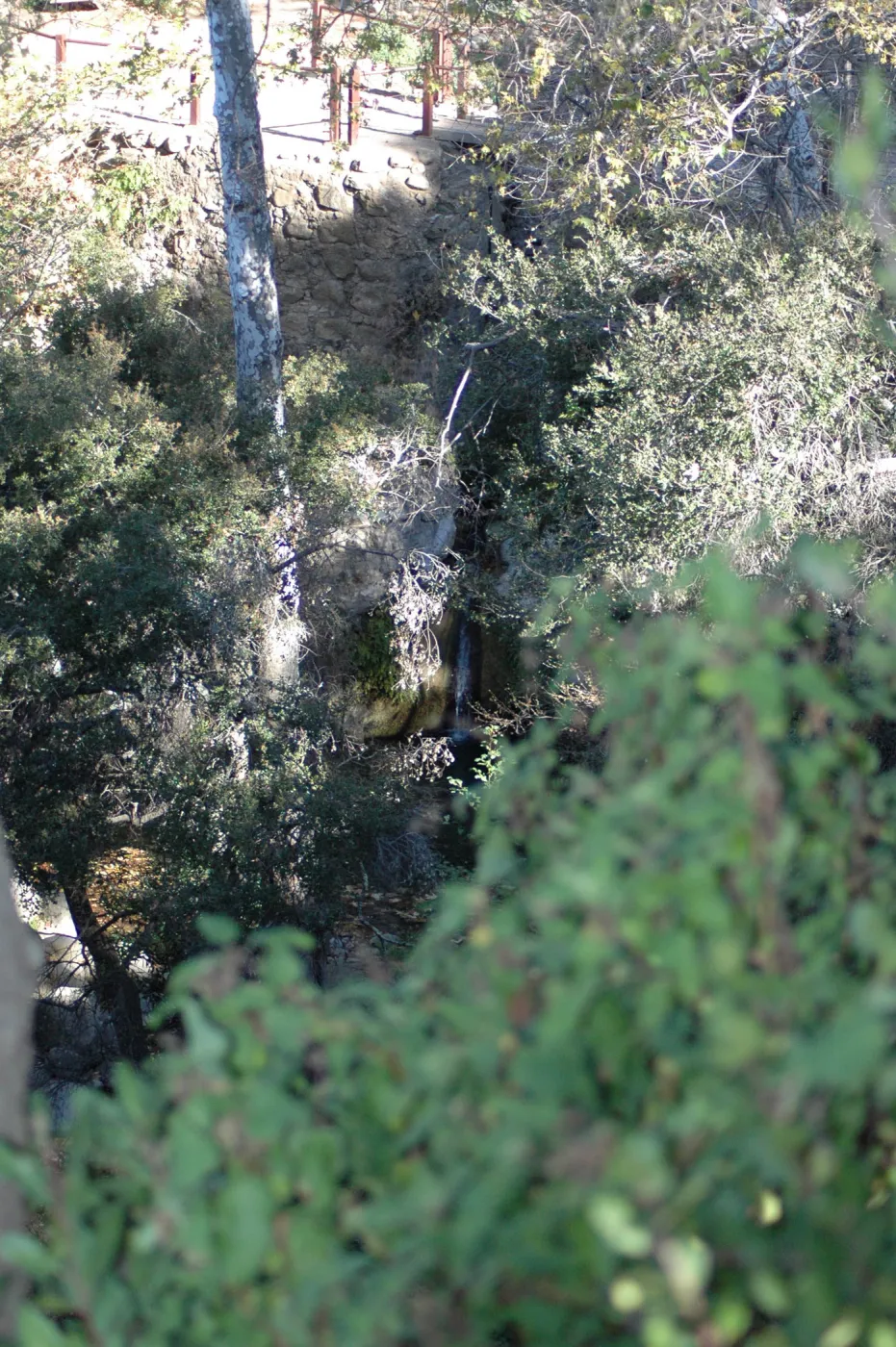 view from canyon rim down to Mission Dam and aqueduct