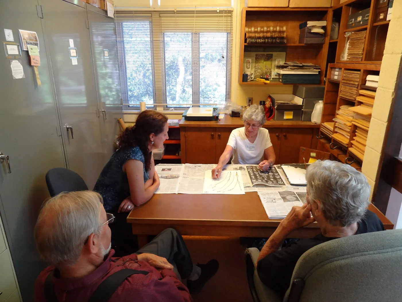 Ky Easton, Herbarium volunteer, mounting herbarium specimens, Denise Knapp