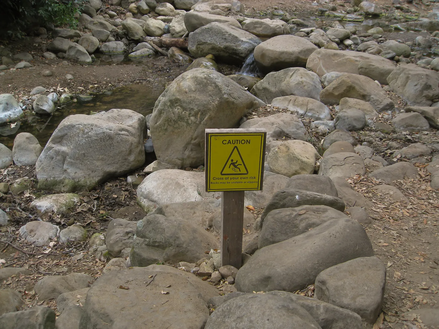 Lower creek crossing caution sign