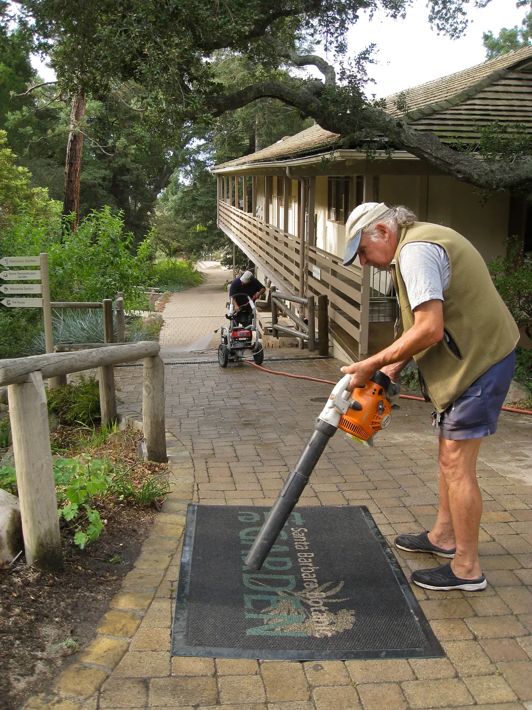Geege Ostroff cleaning the SBBG mat