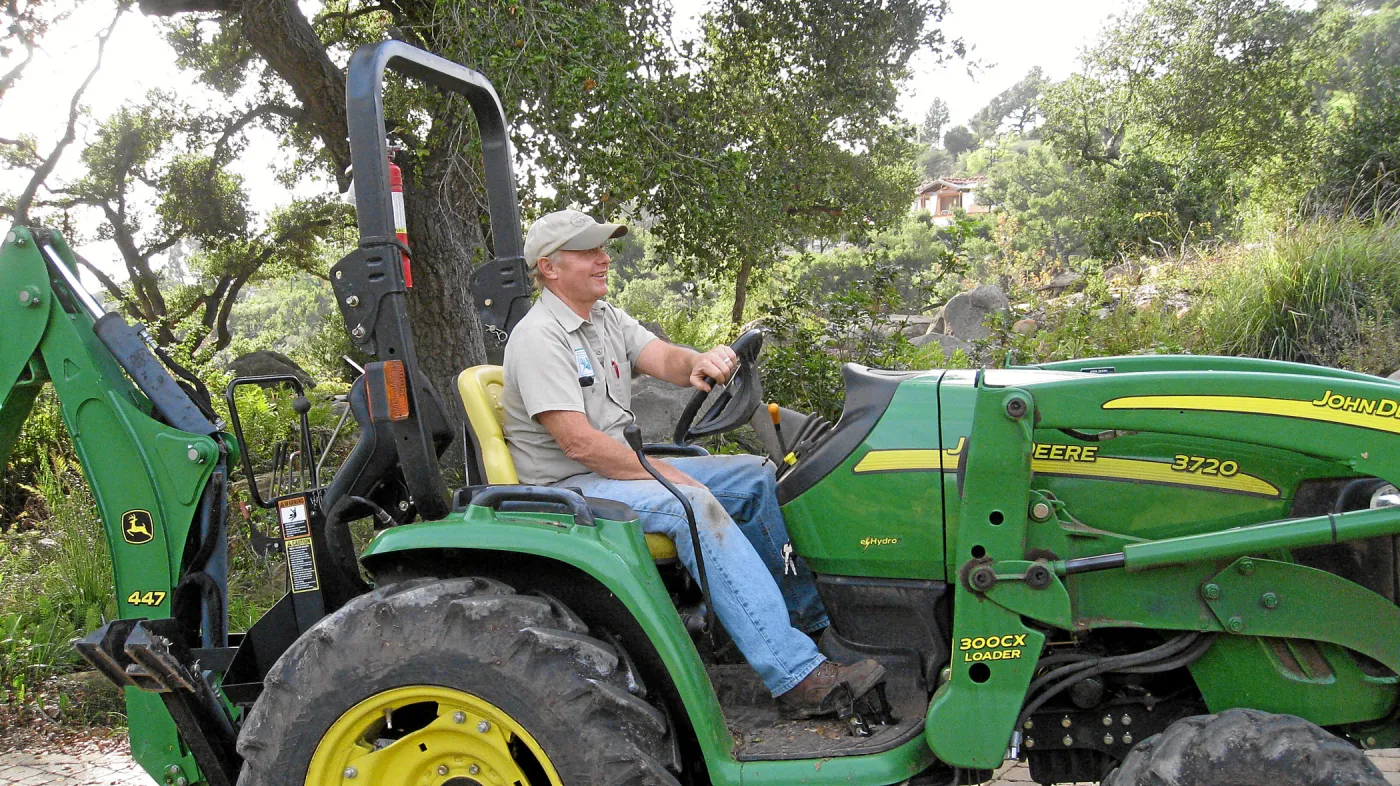 Dave Kershaw digging holes for new oak trees in the Meadow Oaks