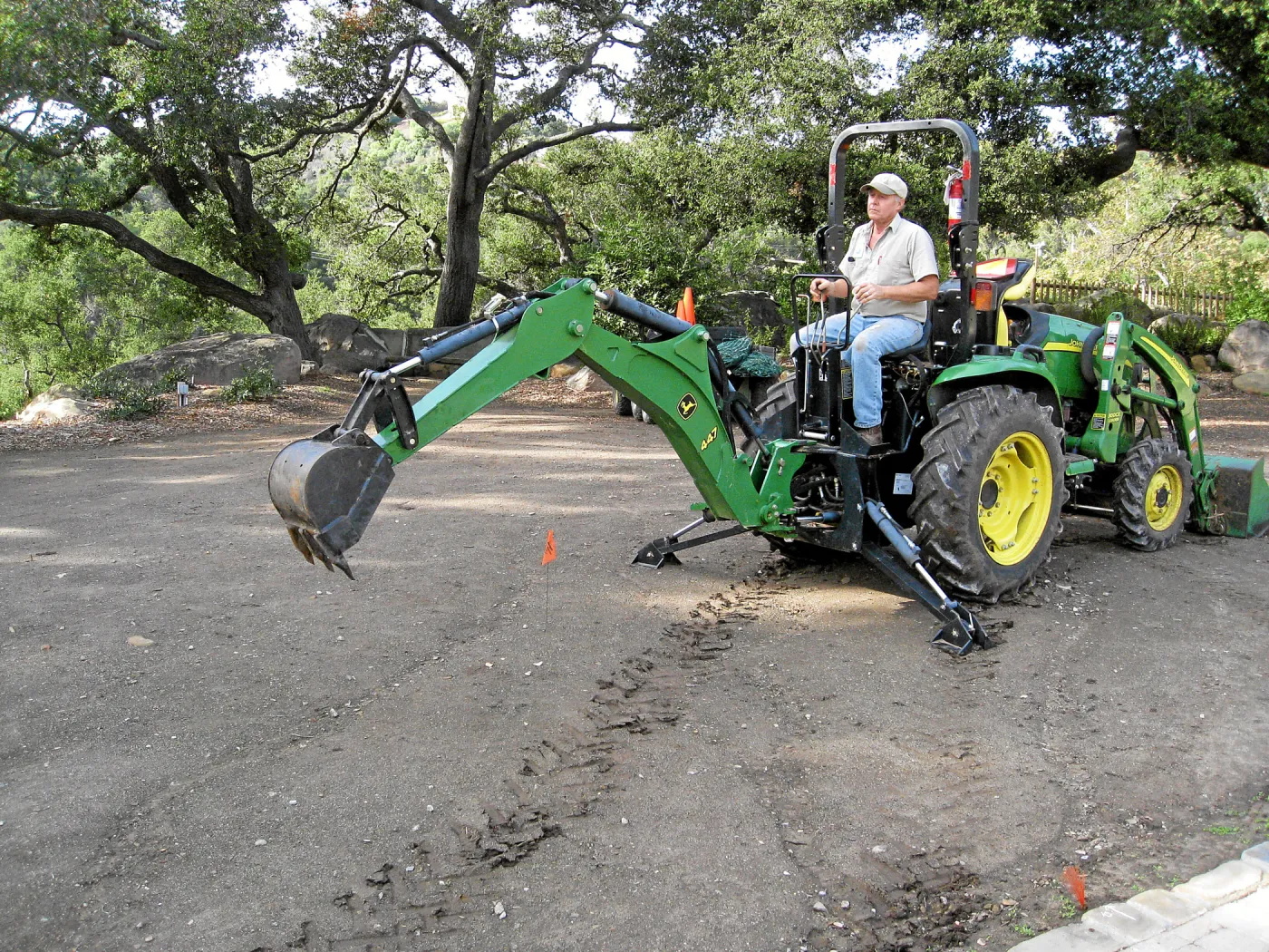 Dave Kershaw digging holes for new oak trees in the Meadow Oaks