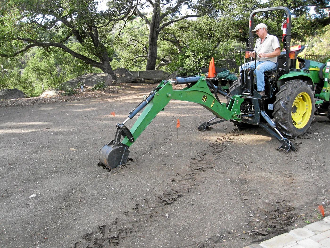 Dave Kershaw digging holes for new oak trees in the Meadow Oaks