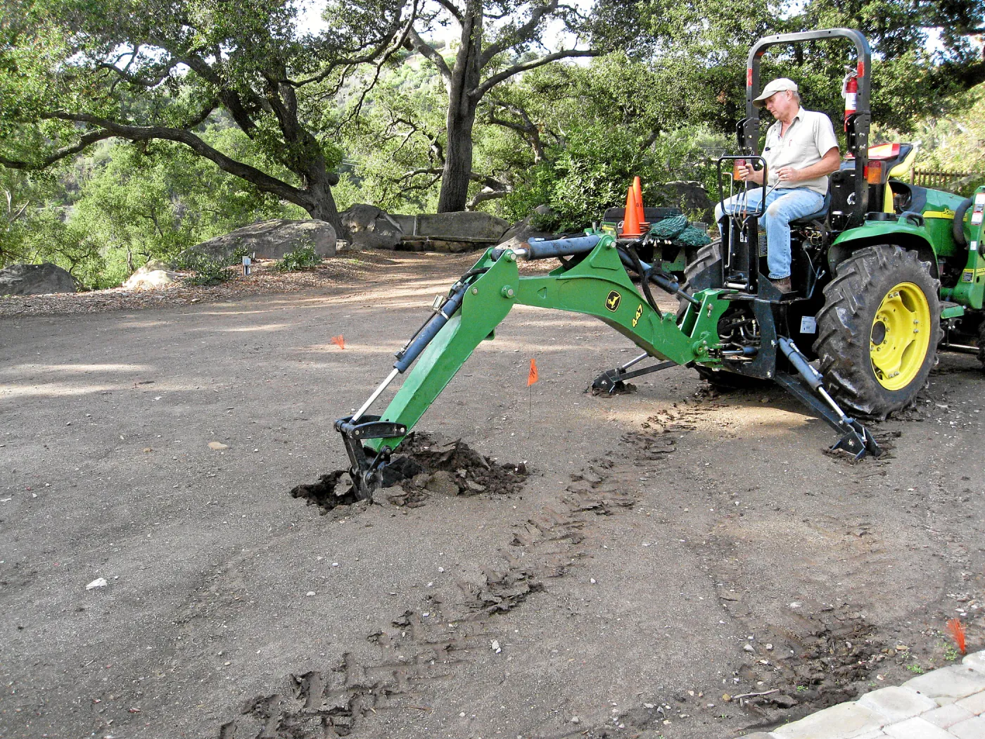 Dave Kershaw digging holes for new oak trees in the Meadow Oaks