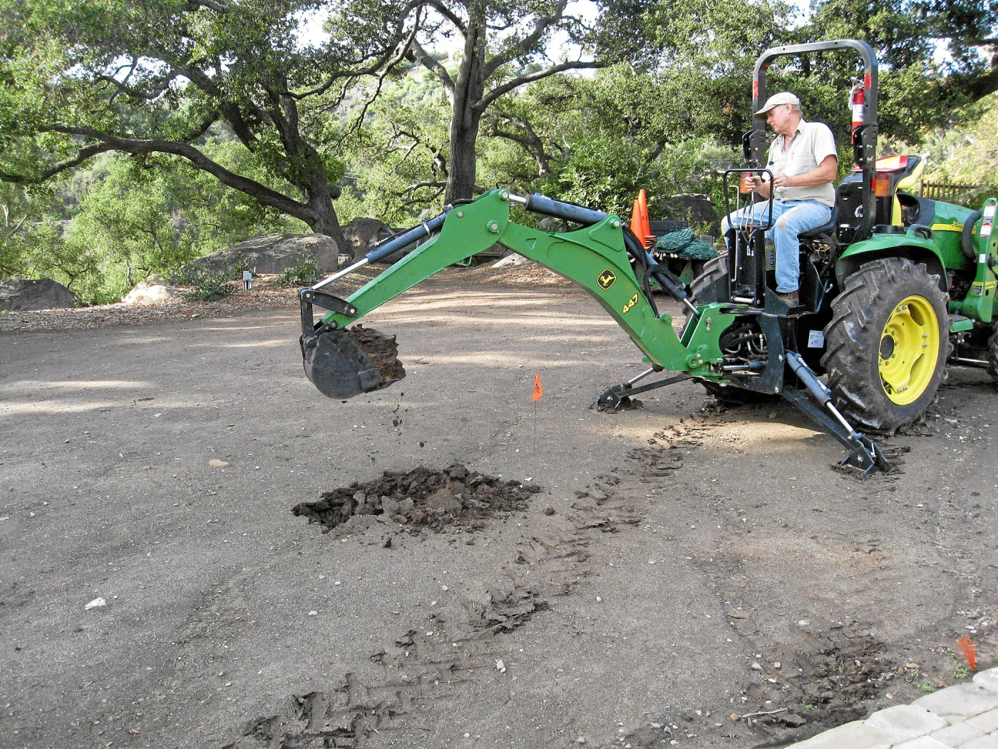 Dave Kershaw digging holes for new oak trees in the Meadow Oaks