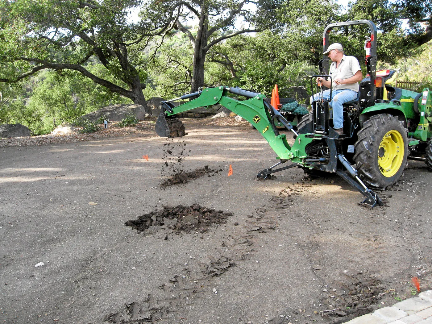 Dave Kershaw digging holes for new oak trees in the Meadow Oaks