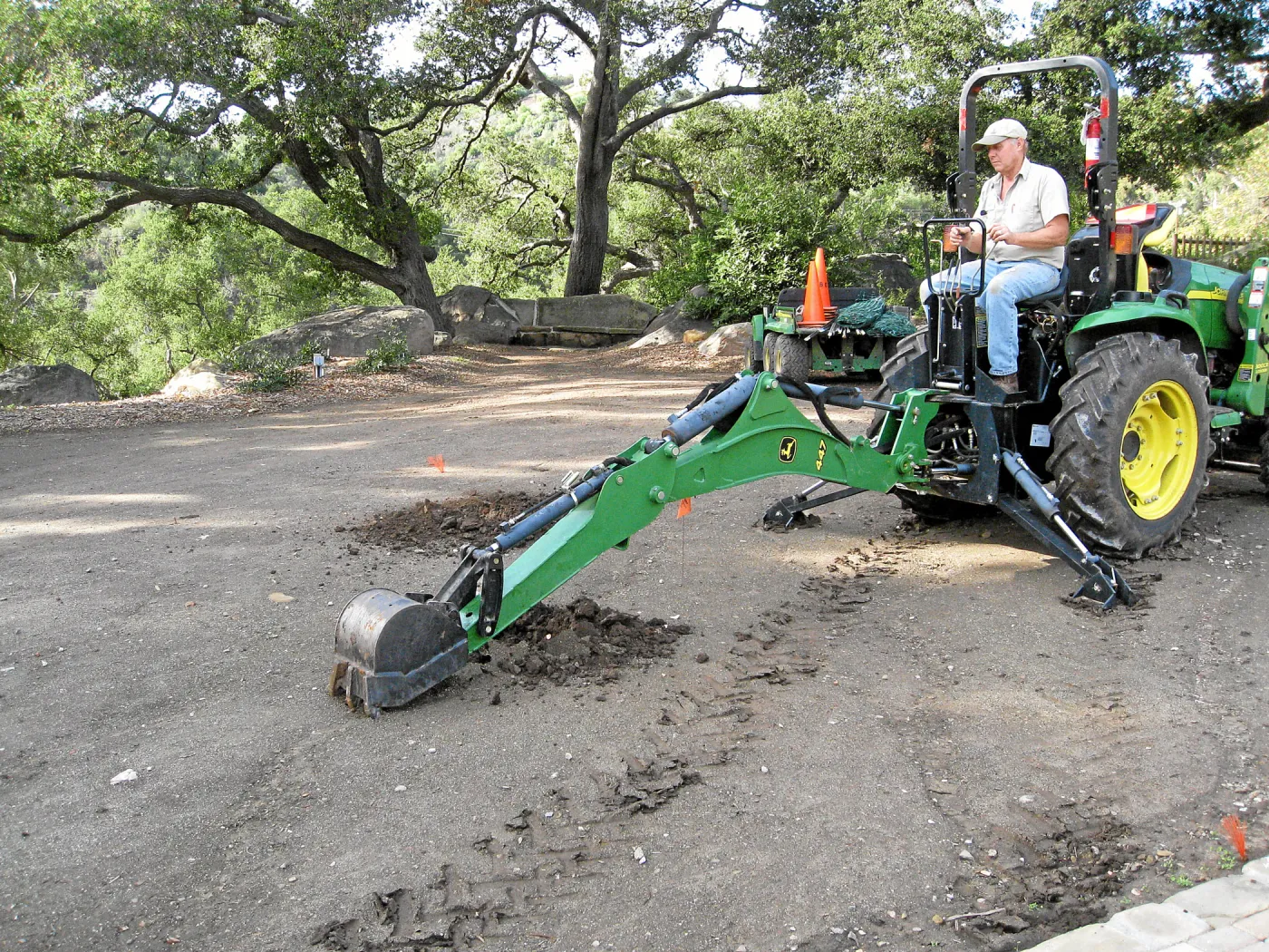 Dave Kershaw digging holes for new oak trees in the Meadow Oaks