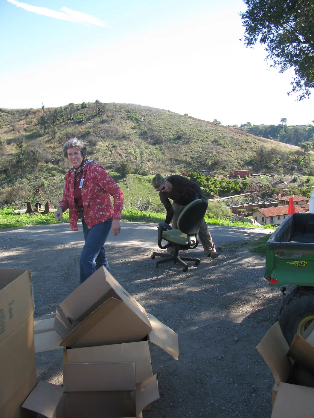 SBBG Staff cleaning out temoporary storage container, after the Jesusita Fire
