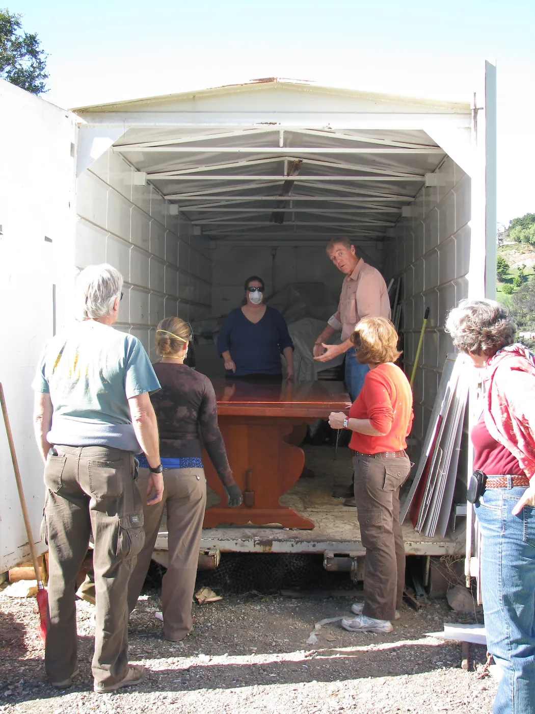 The Library table, SBBG Staff cleaning out temoporary storage container, after the Jesusita Fire