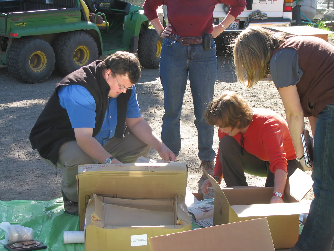 andrew Wyatt, Betsy Collins, Tricia Wardlaw, SBBG Staff cleaning out temoporary storage container, after the Jesusita Fire