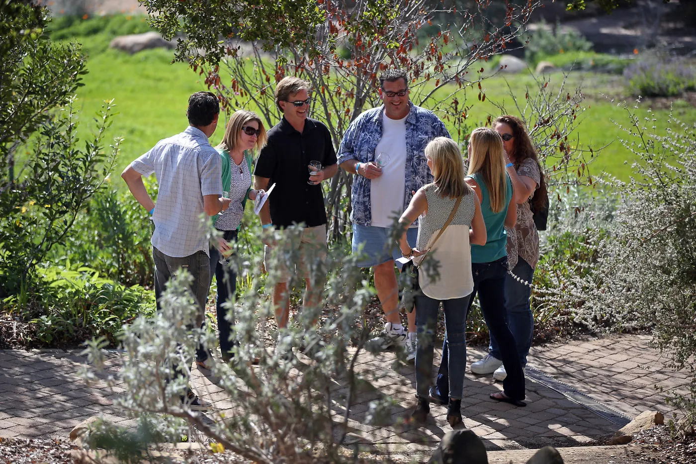Santa Barbara Beer Garden Event, group of visitors on the Upper Meadow pavered path