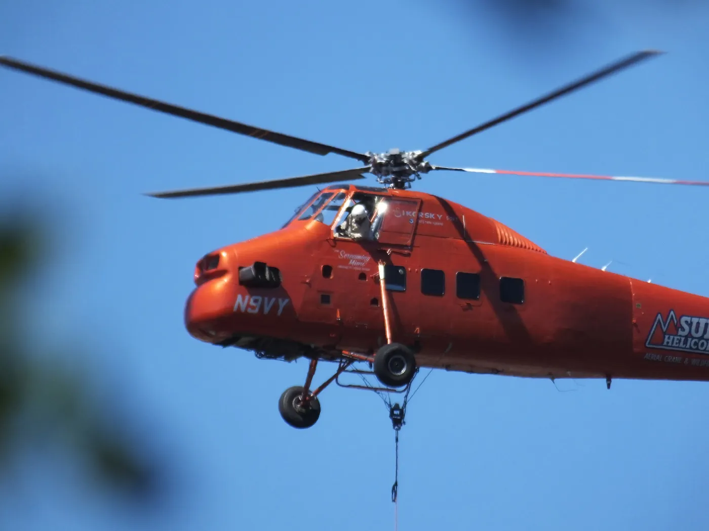 Sikorsky S-58T Screaming Mimi helicopter replacing utility pole in west Mission Canyon