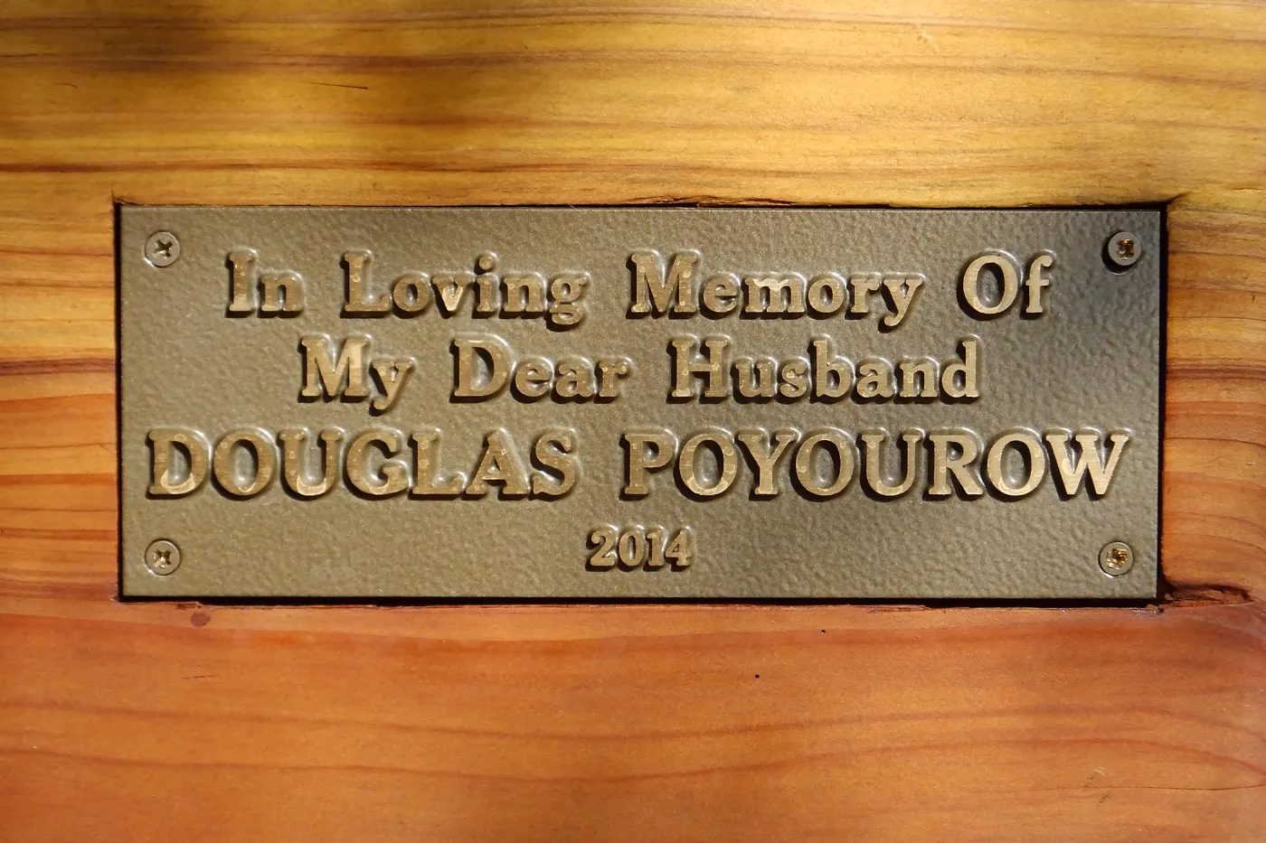 Douglas Poyourow bench plaque