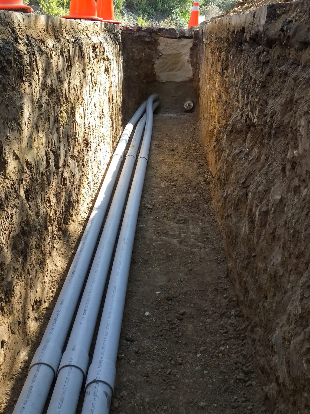 Power and data conduit being installed in the Arroyo Section