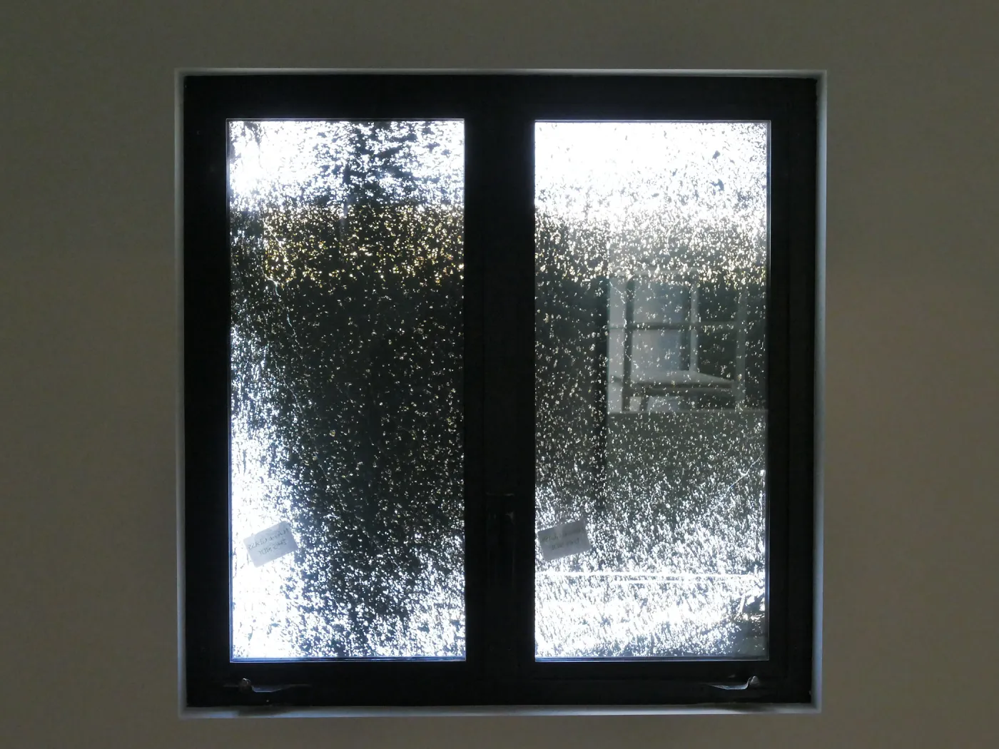 Pritzlaff Conservation Center Construction, stucco overspray patterns outside windows