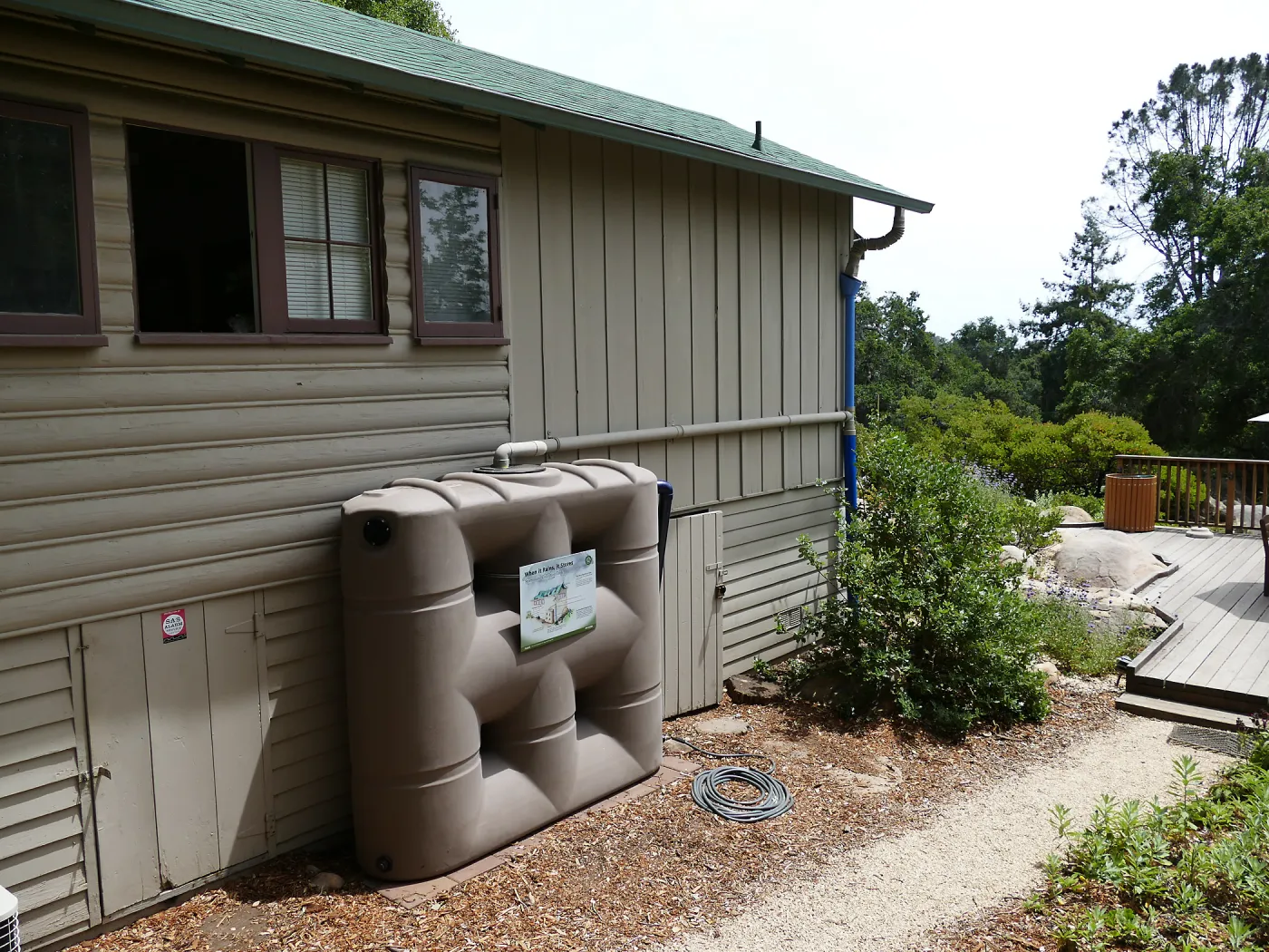 Home Demonstration Garden Renovation, rainwater collection system on west side of Cottage