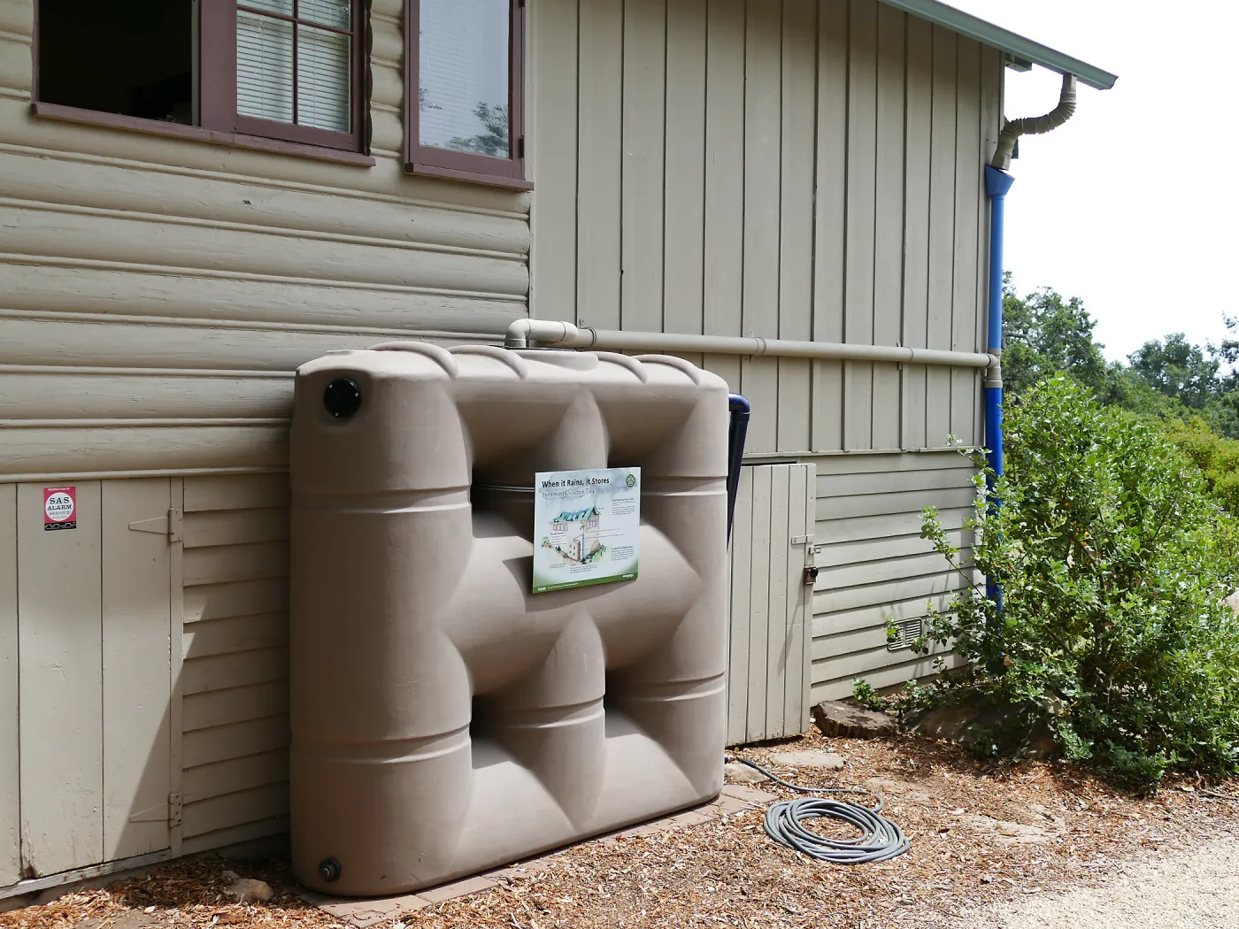 Home Demonstration Garden Renovation, rainwater collection system on west side of Cottage
