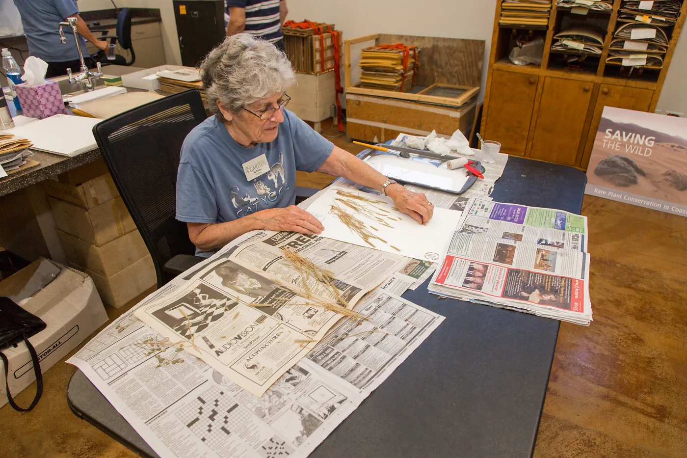 Pritzlaff Conservation Center Ribbon Cutting Celebration, Ky Easton demonstrating herbarium specimen mounting