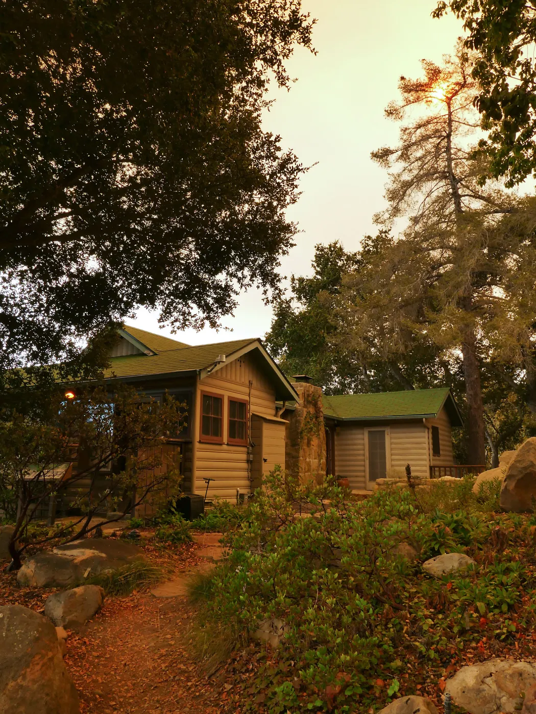 Cottage in smoke-filtered light from Rey Fire