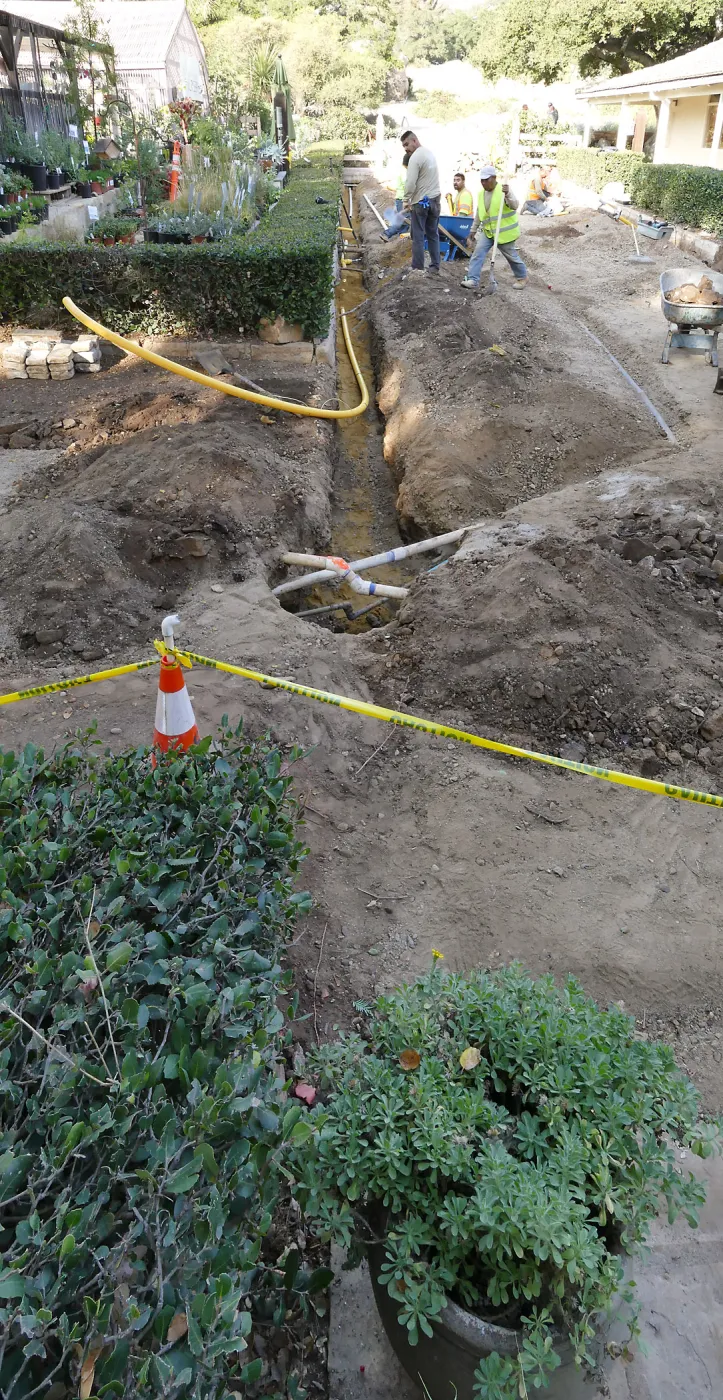 Courtyard renovation, rerouting piping, west edge looking north