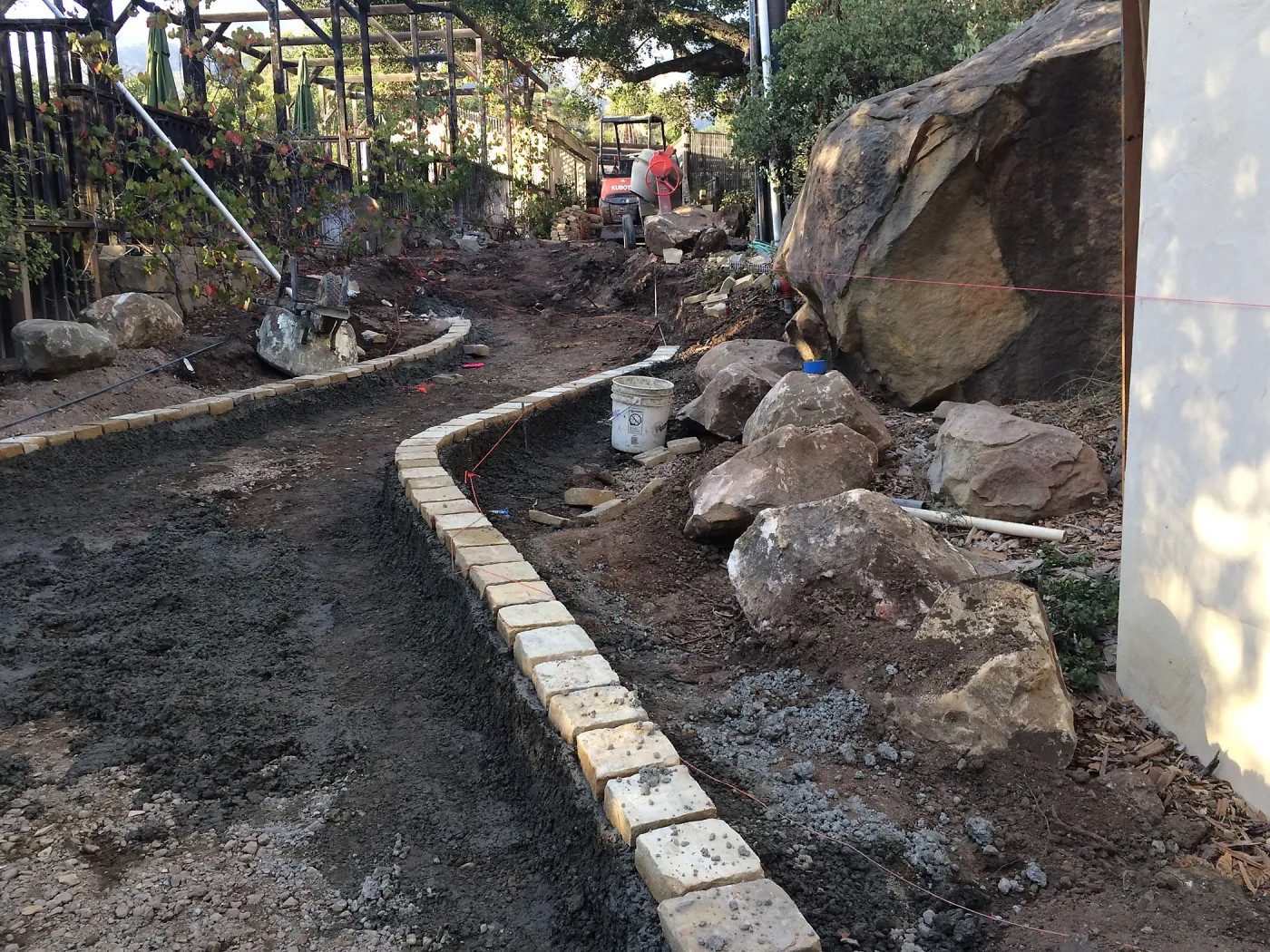 Preparing new path to Cottage and Water Wise Home Garden