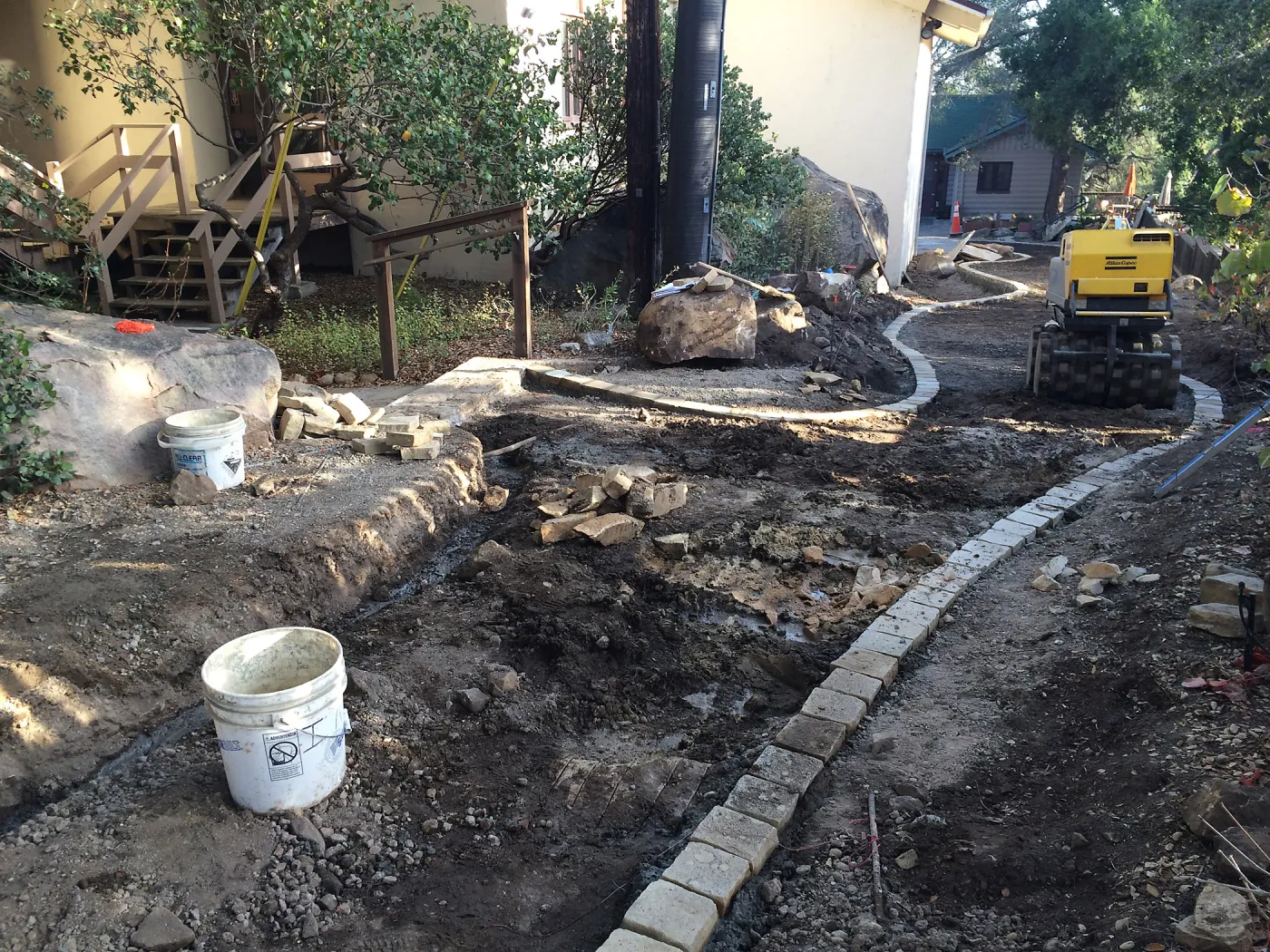 Preparing new path to Cottage and Water Wise Home Garden