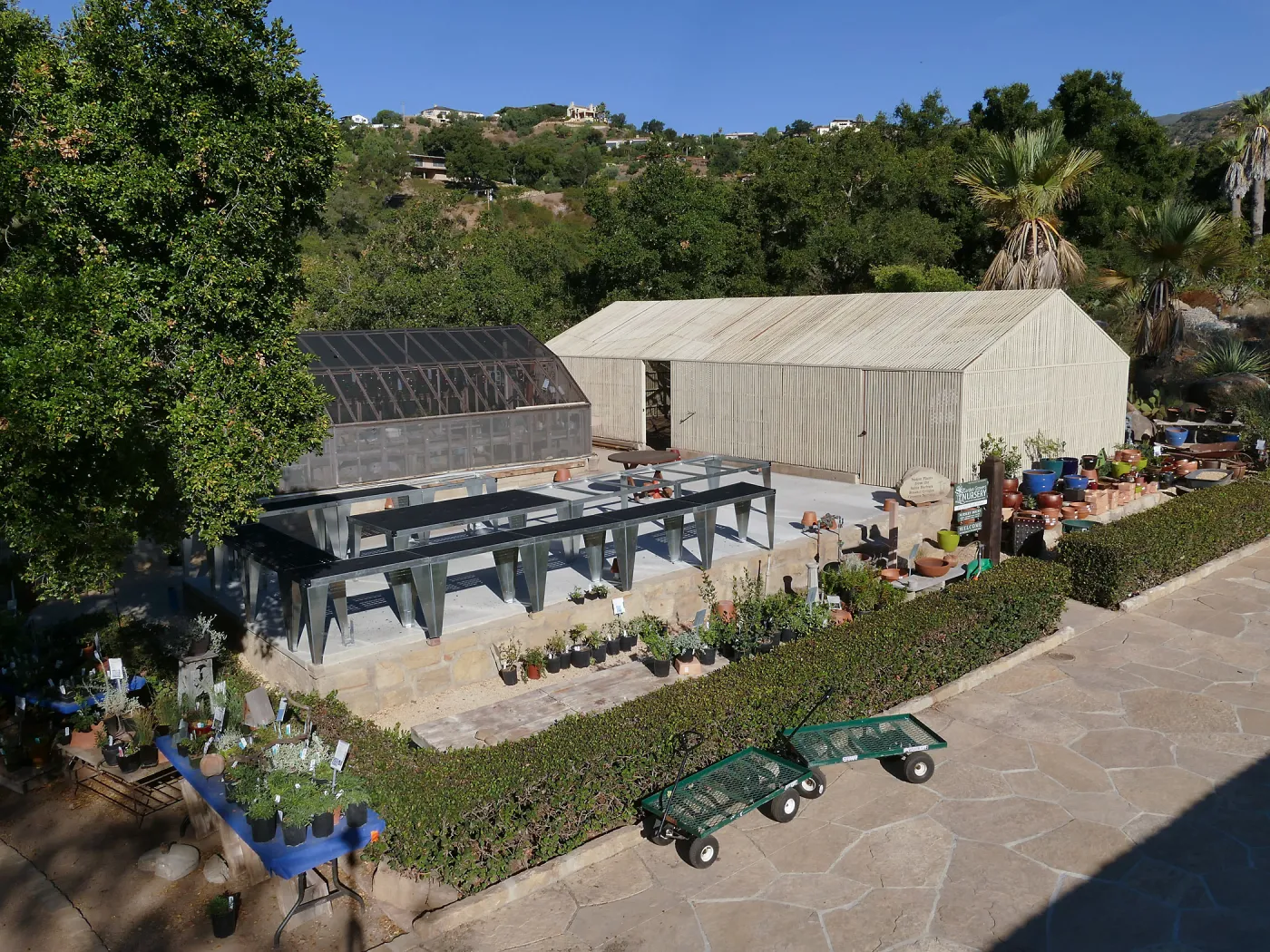 Repaired Lath House and new steel plant benches in the Garden Growers Nursery