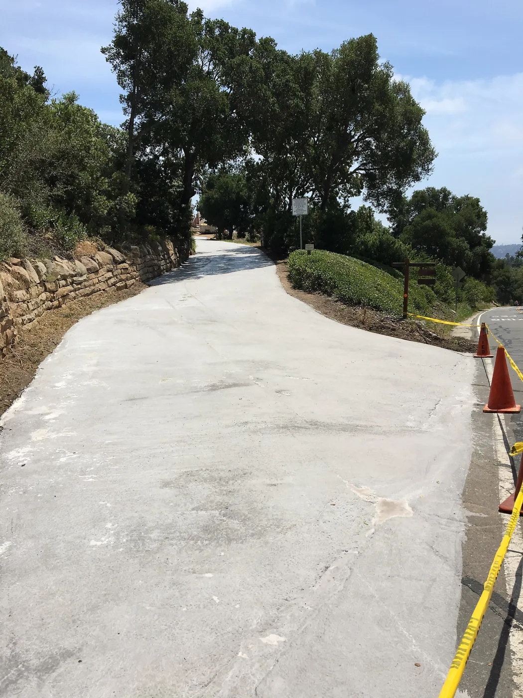 Light colored ecosealant on driveway heading to Pritzlaff Conservation Center