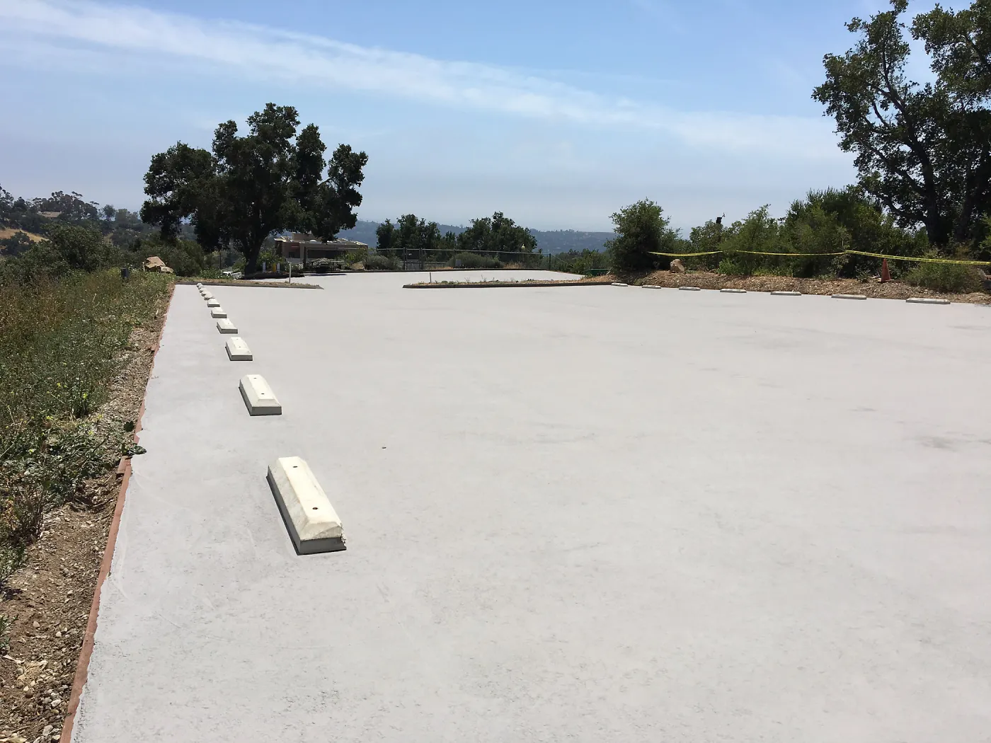 Light colored ecosealant on upper parking lot