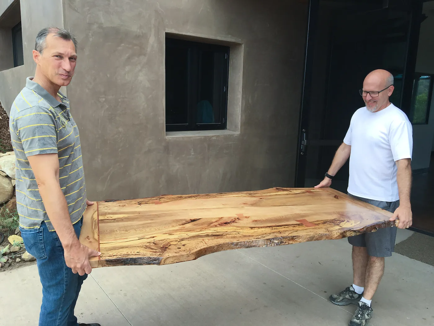 Steve Windhager and Sven Nebelung with new table for director's office