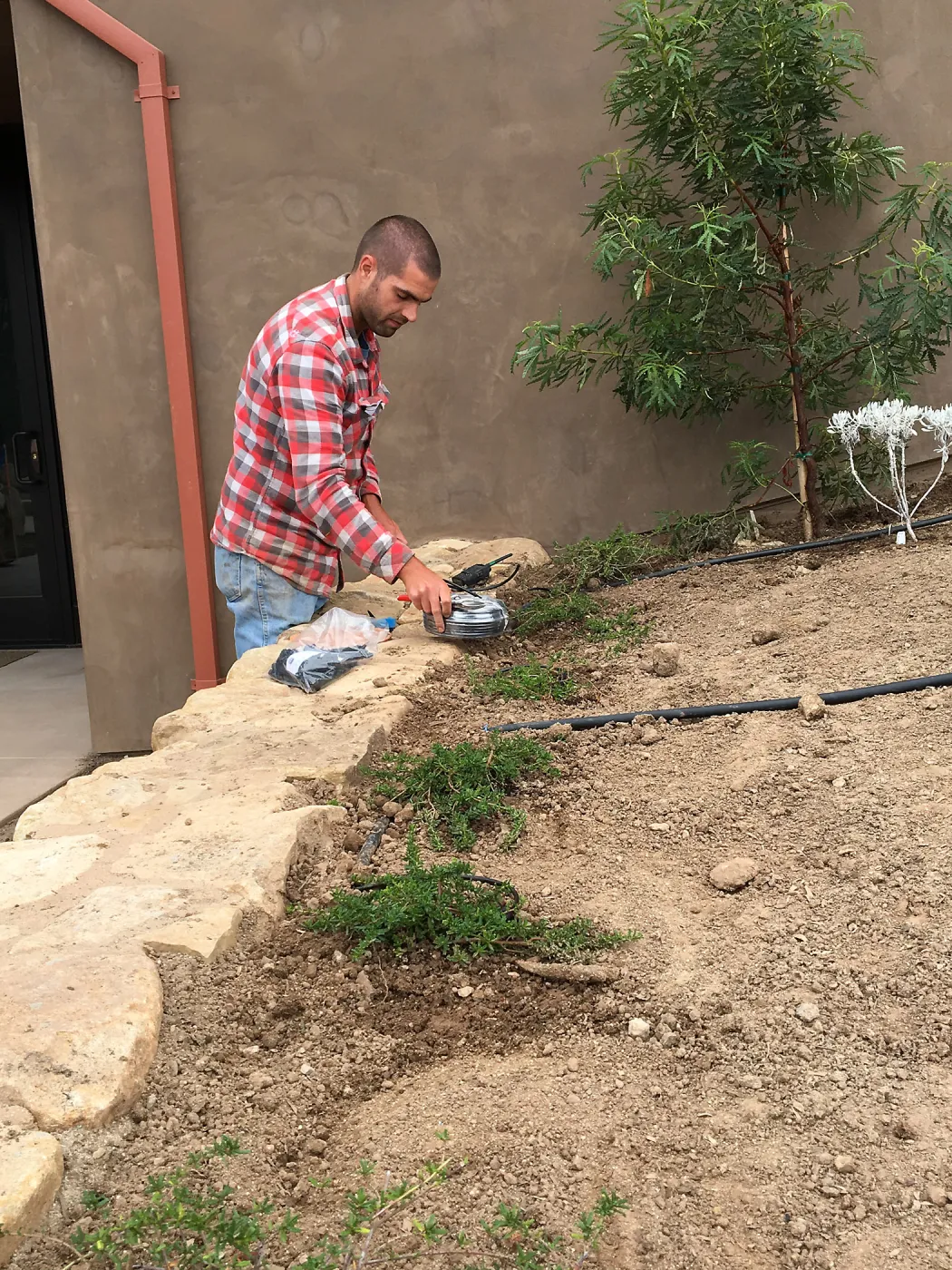 Wes Franken planting conservation bed at the Pritzlaff Conservation Center