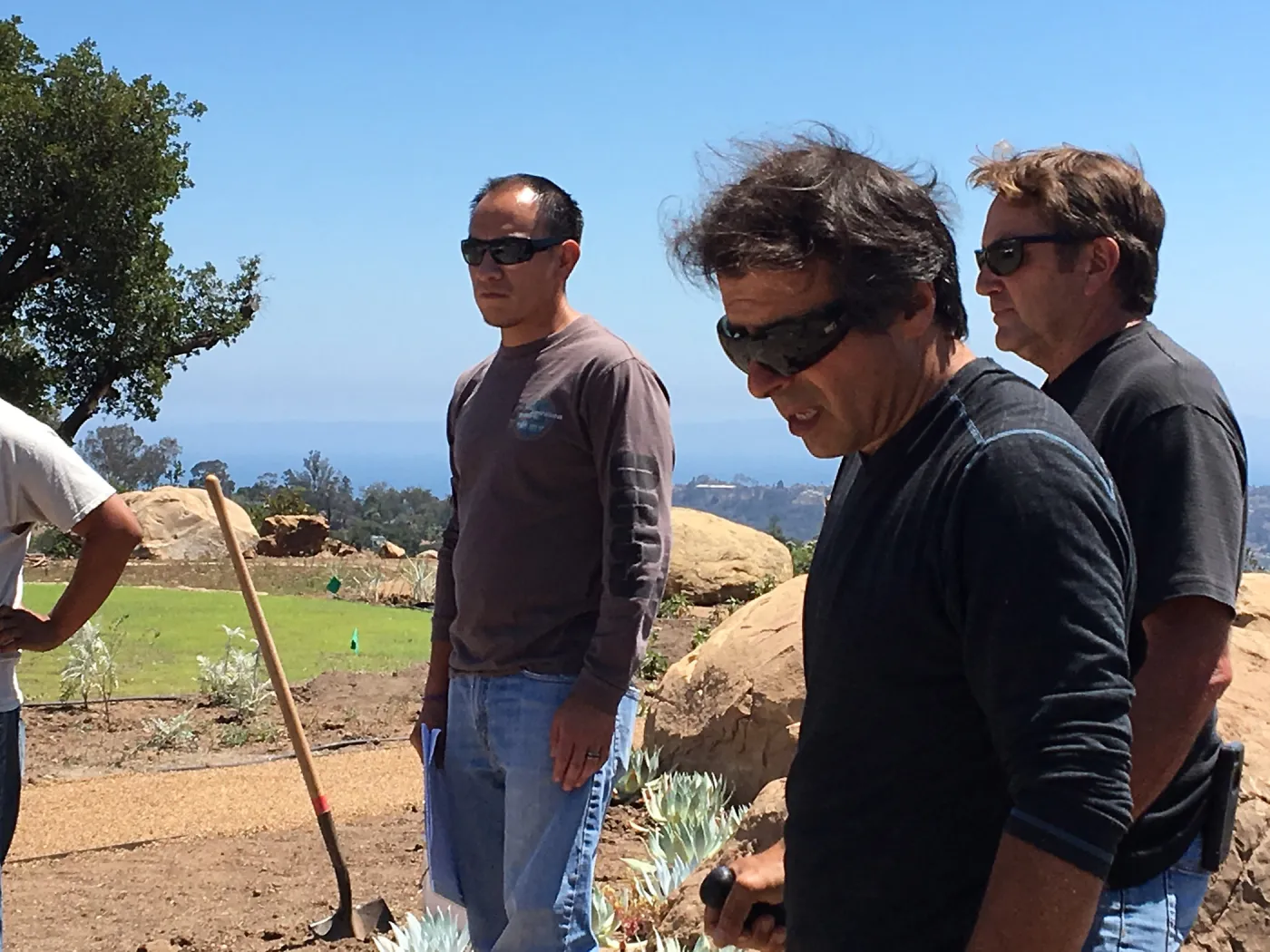 Fernando Orta, Michele Bandinu, Mike Jacobson installing Island Sculpture