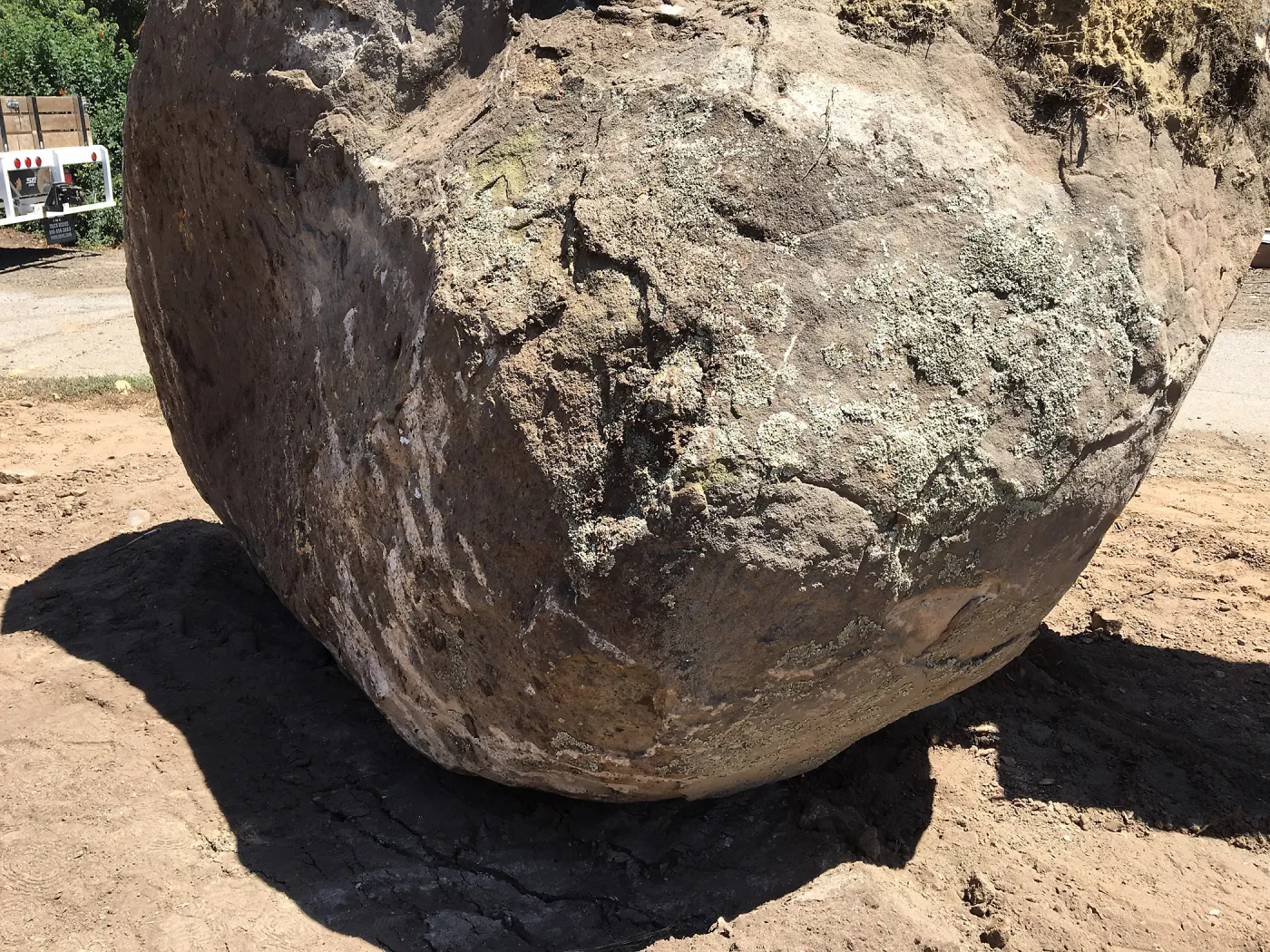 Boulder at Hansen site moved prior to Horticulture Barn construction