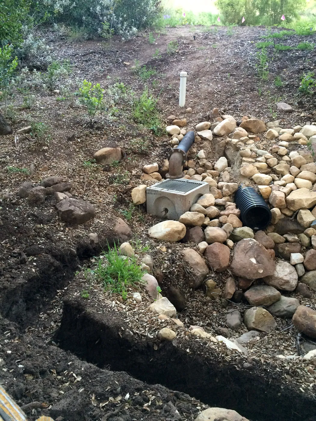 Installation of runoff collection pipe connection from Pritzlaff Conservation Center to well tank