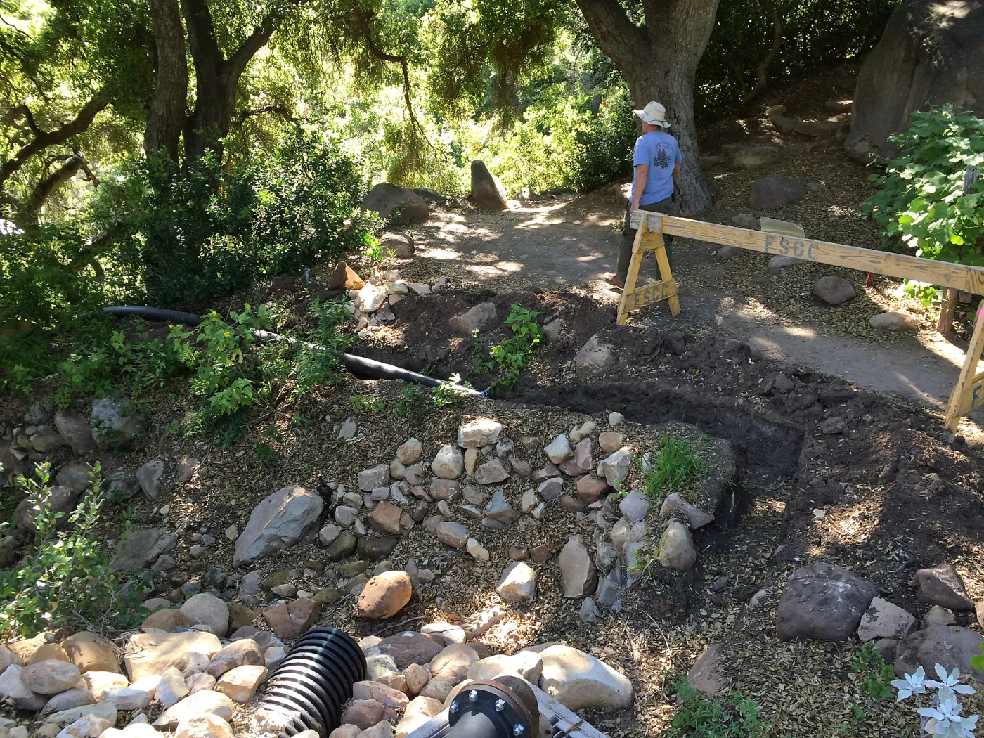 Installation of runoff collection pipe connection from Pritzlaff Conservation Center to well tank