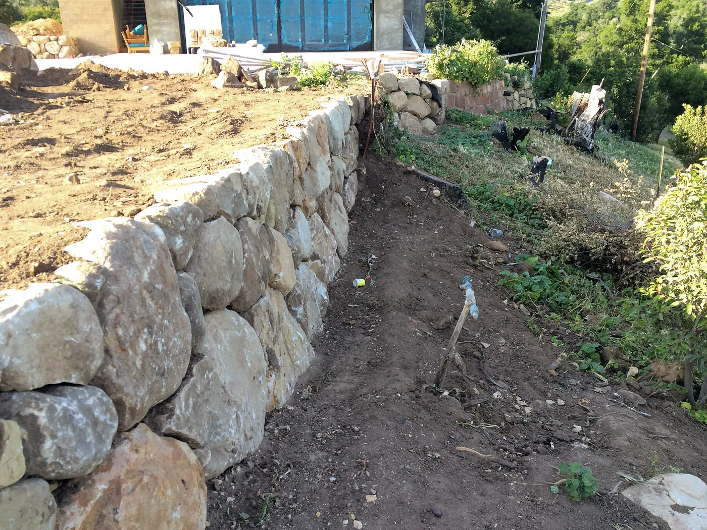 Reconstruction of east side wall at the Conservation Center