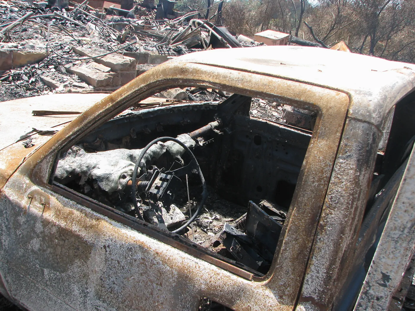 Burned Garden equipment at Gane House after Jesusita Fire