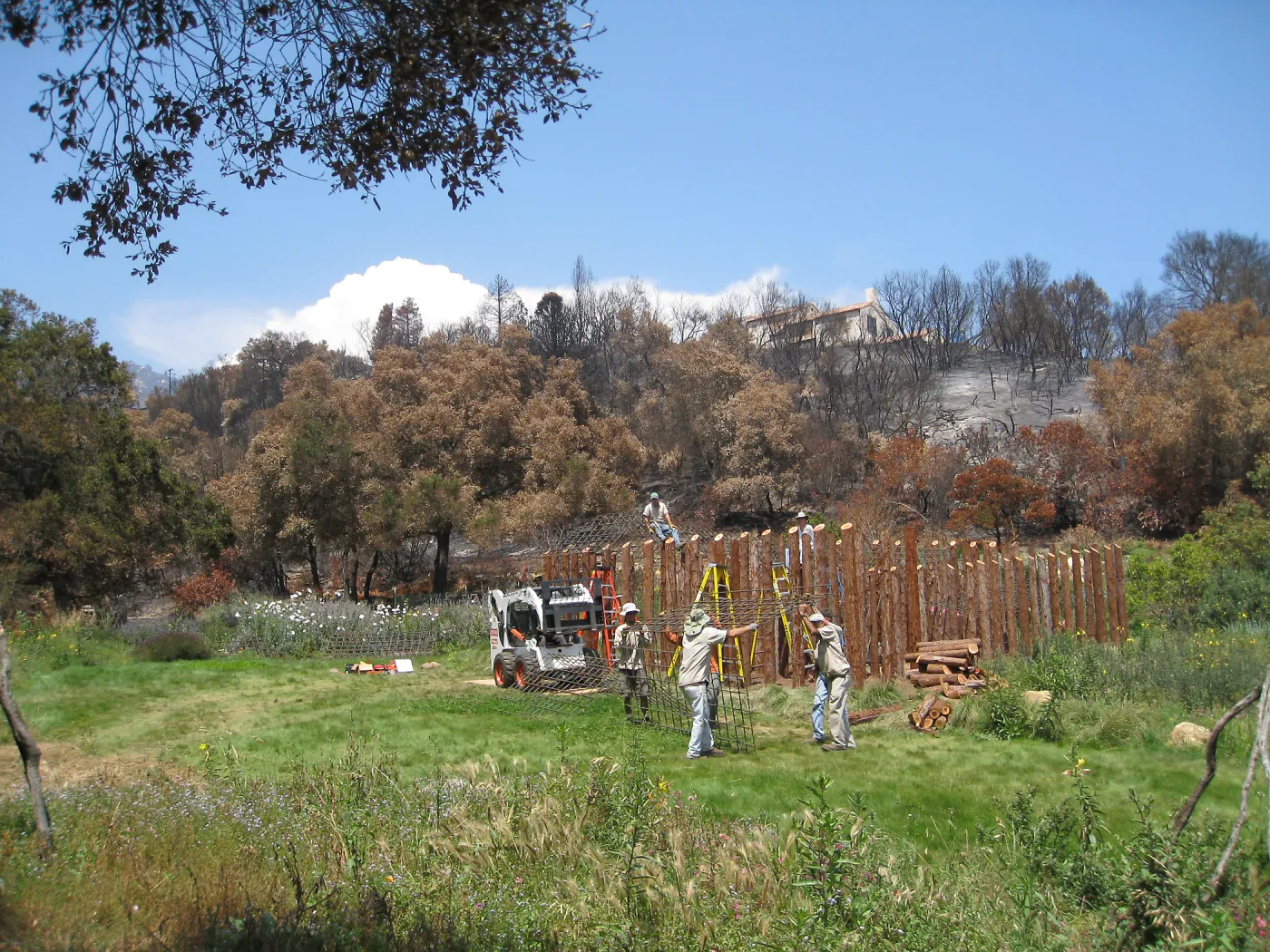 Construction of Herb Parker's â€˜Haven' labyrinth, placing roof structure