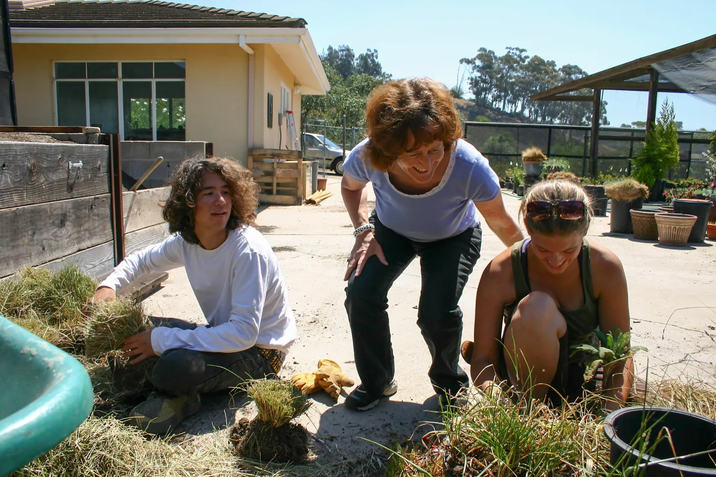 Volunteer, Betsy Collins, Heather Wehnau working at Horticulture Unit